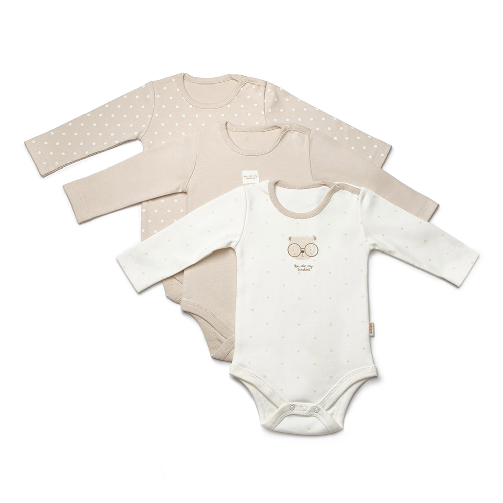 Set 3 body-uri bebeluși crem și alb – bumbac moale, mânecă lungă Set 3 body-uri bebeluși crem și alb din bumbac moale, cu mânecă lungă – model ursuleț și buline, îmbrăcăminte practică și confortabilă pentru copii