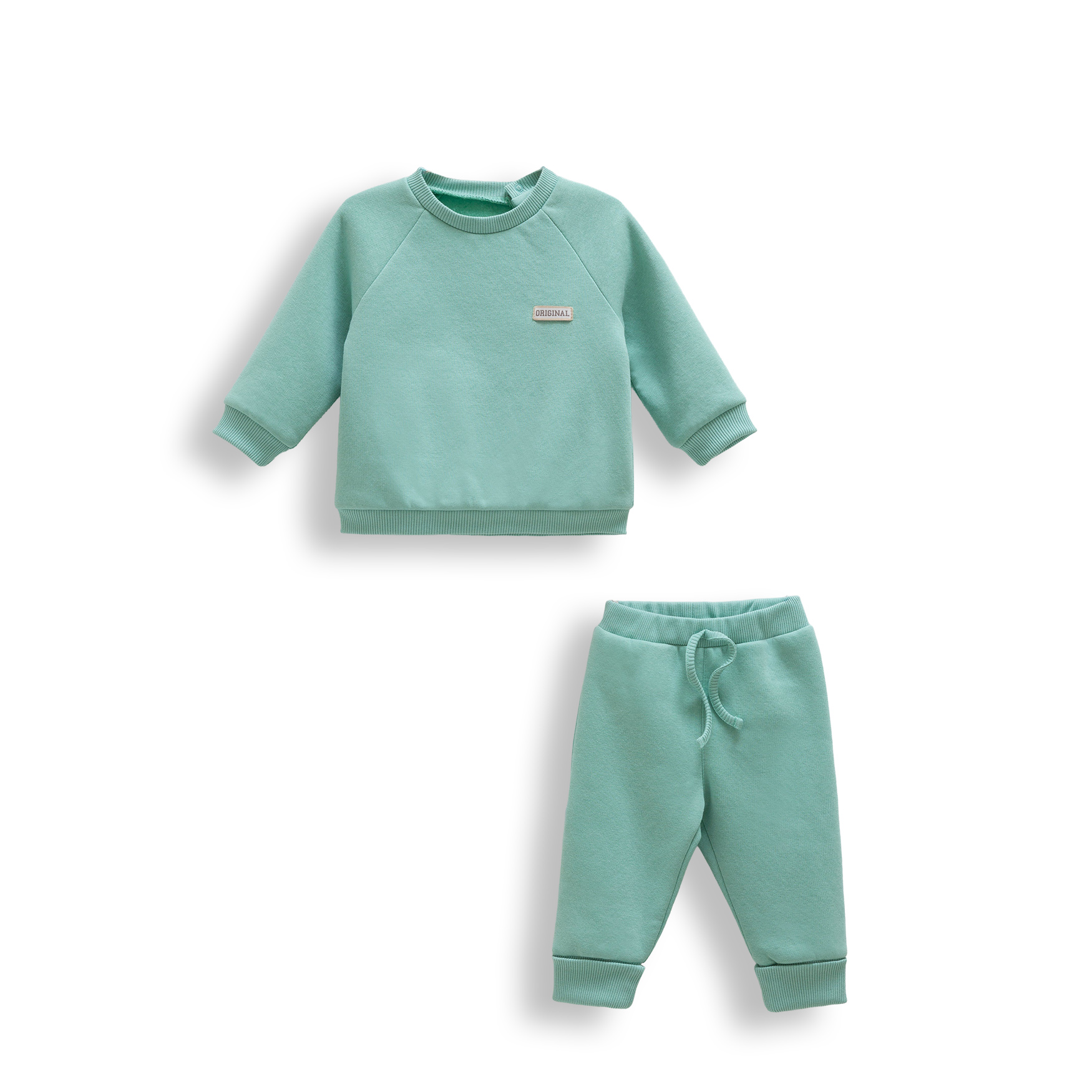 Set „Verde mentă” pentru bebeluși – bluză și pantalonași verzi Set „Verde mentă” pentru bebeluși – bluză și pantalonași verzi